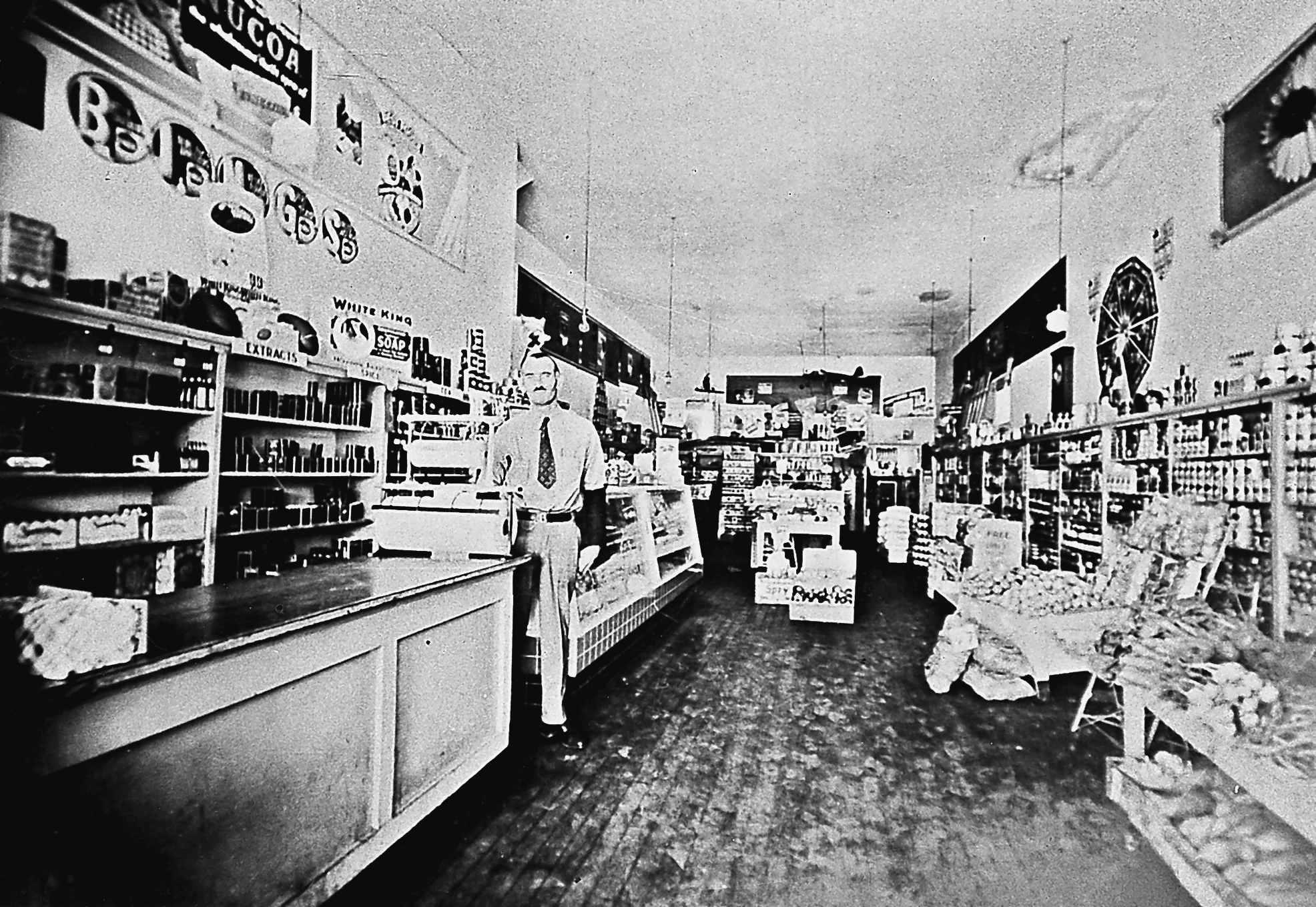 C.M. Petty is shown here inside his Yosemite Avenue store in 1938