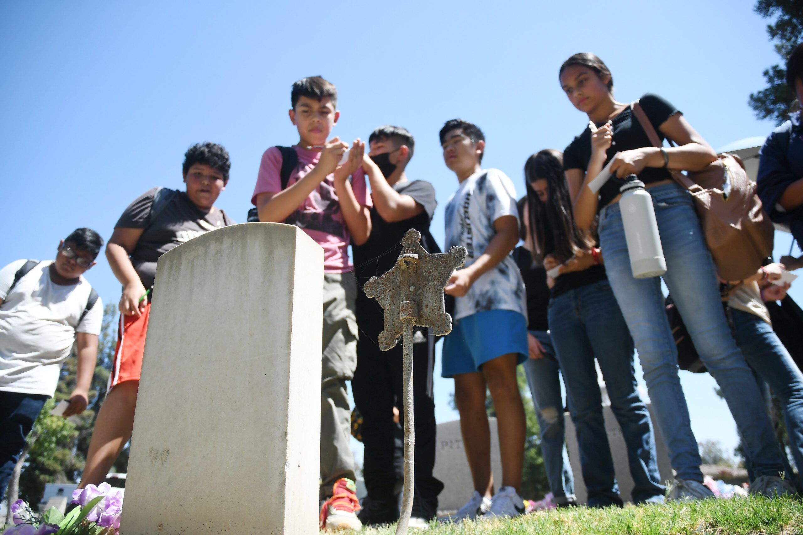 students in the cemetery